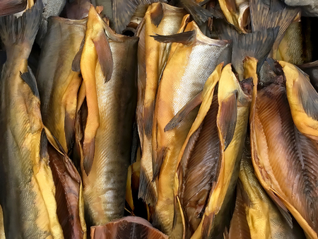 Food background - Mouth-watering smoked fish (mackerel) close-upの写真素材