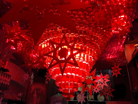 LVIV, UKRAINE - DECEMBER 21:  Chandelier made from bottles of cherry liqueur in the bar "Drunk cherry" in the center of Lvov on December 21, 2016 in Lviv, Ukraineのeditorial素材
