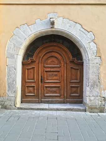 Old wooden gate in the center of Lviv, Ukraineの写真素材