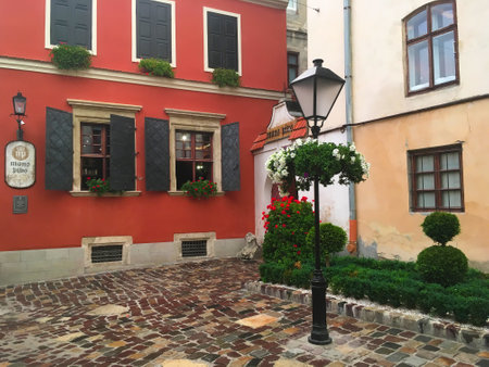 LVIV, UKRAINE - JULY 11: Beautiful city landscape - Mons Pius Restaurant in the building of the first pawnshop bank in Lviv on July 11, 2017 in Lvov, Ukraineのeditorial素材