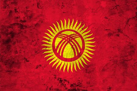 Flag of the Kyrgyzstan against the background of the stone textureの写真素材