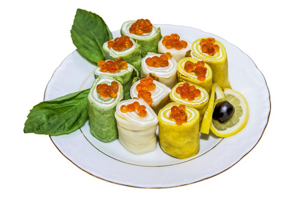 Pancake rolls (blin-roll) with red caviar isolated over whiteの写真素材