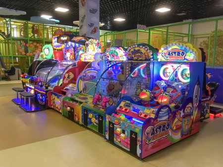 LVIV, UKRAINE - DECEMBER 01: Entertainment for children - Children's slot machines in the shopping...