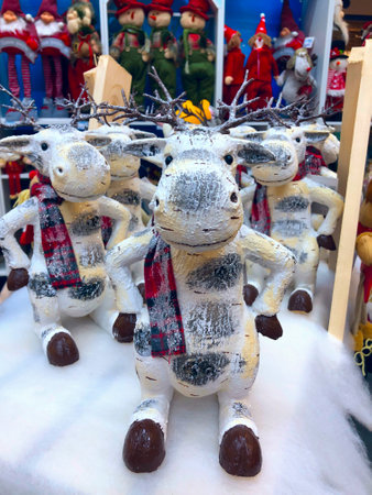 LVIV, UKRAINE - DECEMBER 03: Funny Christmas toy deer lying in a showcase in a supermarket "Epicentr" on December 03, 2019 in Lvov, Ukraineのeditorial素材