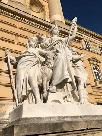 LVIV, UKRAINE - MARCH 10:  Sculptural group Work at the entrance to Lviv University on March 10, 2020 in Lvov, Ukraineのeditorial素材