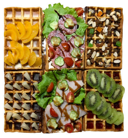 Appetizing snacks made from vegetables, fruits, meat and nuts close up, isolated on whiteの写真素材