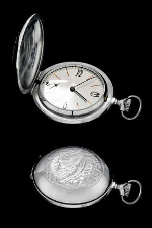 Old clock with artwork, opened and closed, isolated on black