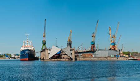 Shipyard with ships panorama at day time with clear skyの写真素材