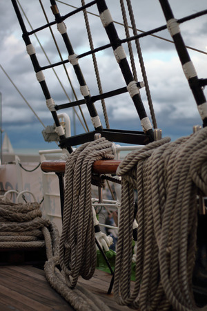 Ancient wooden sailboat pulleys and ropes detailの写真素材