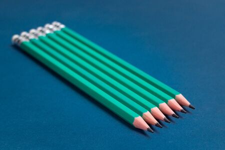 isolated pencils on blue backgroundの写真素材
