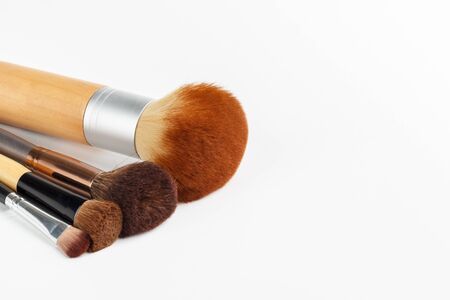 Makeup brushes of different sizes on a white backgroundの写真素材