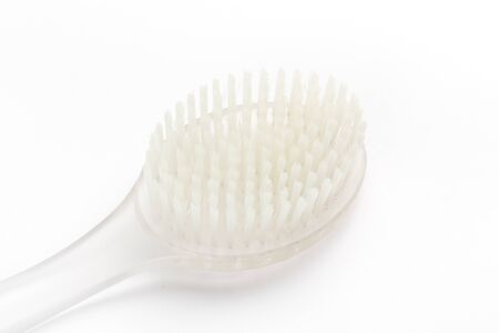 Shower brush on a white backgroundの写真素材