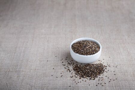 Chia beans in a bowl on the tableの写真素材
