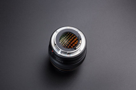 Kamyanets-Podilskyi, Ukraine - May 22, 2020: Canon EF-85mm F / 1.8 USM Lens on black blackground.のeditorial素材