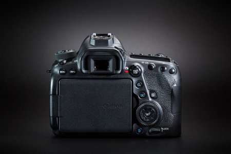 Kamyanets-Podilskyi, Ukraine - May 22, 2020: Canon EOS 6D Mark II Body on black background. Rear view.のeditorial素材