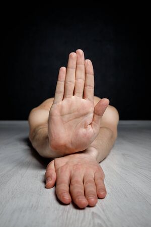 Contemporary dance positions. Hands on the foreground.の写真素材