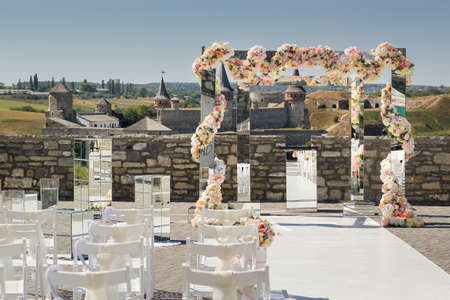 Wedding decoration of mirrors and flowers for the wedding ceremonyの写真素材