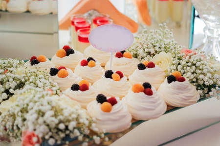 Sweets at a candy bar at a wedding celebrationの写真素材