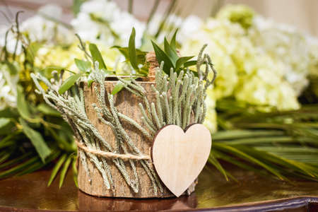 Wooden box for wedding rings on the tableの写真素材