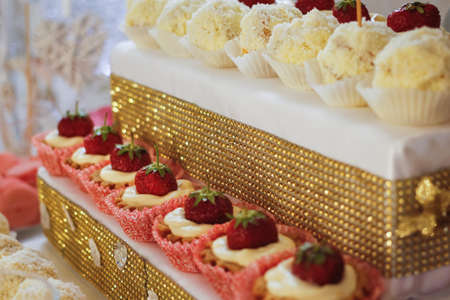 Delicious cakes on a tray selective focusの写真素材