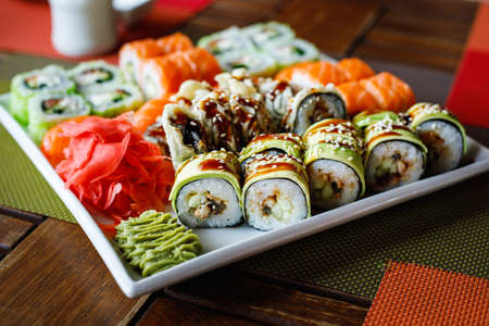 Sushi set of different types on a plate. Sushi in the sushi bar.の写真素材