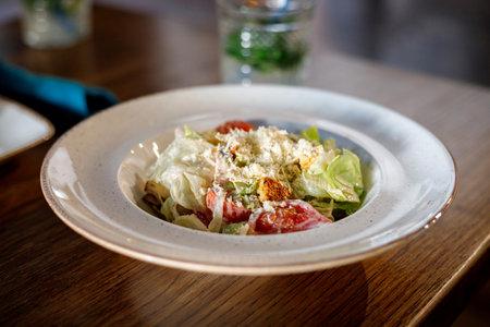 Fresh Caesar salad on a plateの写真素材