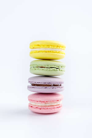 Stack of colorful macaroons on a white backgroundの写真素材