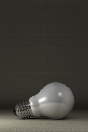 Arbitrary white glossy light bulb lying on gray squared backgroundの写真素材