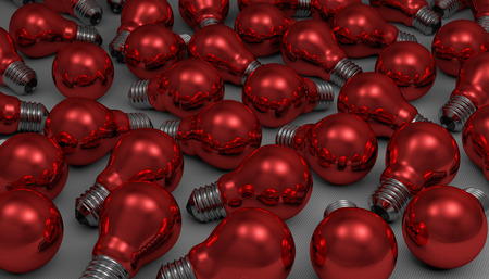 Many arbitrary red glossy light bulbs lying on gray squared background