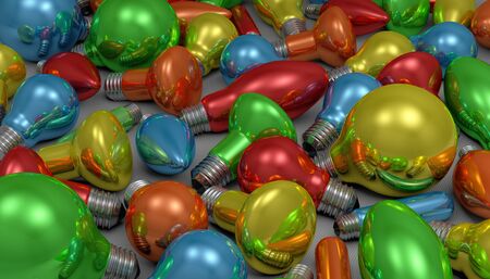 Many multicolor glossy light bulbs of different shapes lying on gray squared backgroundの写真素材