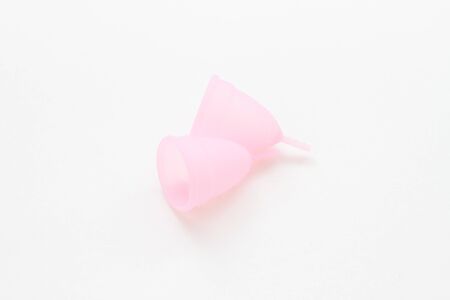reusable container for menstruation, vaginal cup on a white backgroundの写真素材