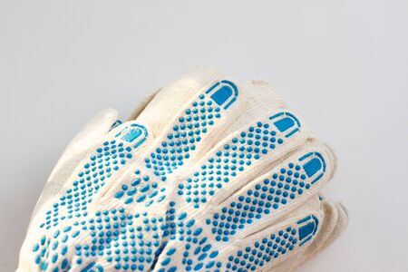 packaging of Safety white protective cotton gloves for workの写真素材