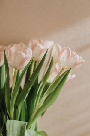 bright tulip bouquet in a glass vaseの写真素材