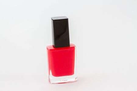 red nail polish bottle on white background, isolatedの写真素材