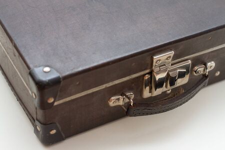 classic black retro briefcase on a white backgroundの写真素材