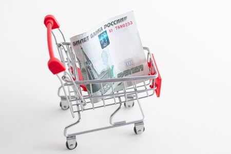 paper 1000 Russian rubles in a mini basket for shoppingの写真素材