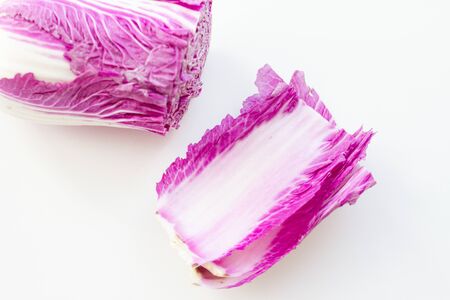 fresh purple cabbage leaves on a white backgroundの写真素材