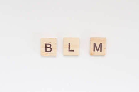 BLM Inscription made of wooden blocks. Black Lives Matter protestの写真素材