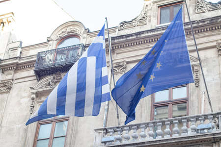Greek Embassy in Turkey. The flag of the European Union and Greece on the consulate building. The...