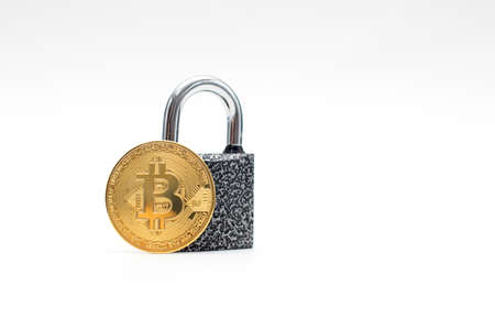 Golden Bitcoin coin and padlock isolated on white background