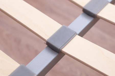 Bed frame. Wooden slats of a bed. Birchen an arthopedic base of a bed.の写真素材