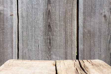Old wooden wall and empy wooden planks backdrop background. Mock up template for display and showing...