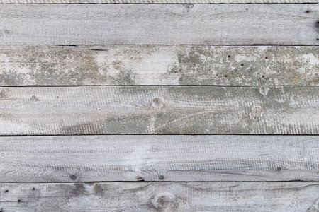 Gray rustic rural wooden background. Weathered barn wood planks background.の写真素材