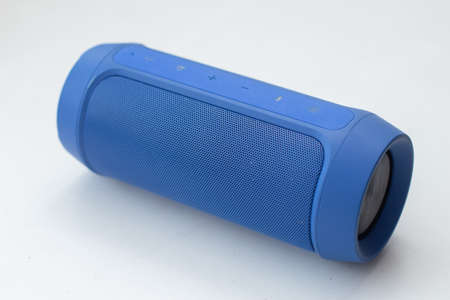 Portable wireless speaker on white background.
