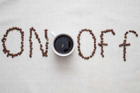 Word Off and word On made of roasted coffee beansの写真素材