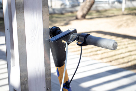 Electric scooter parked for rent on the city.の写真素材