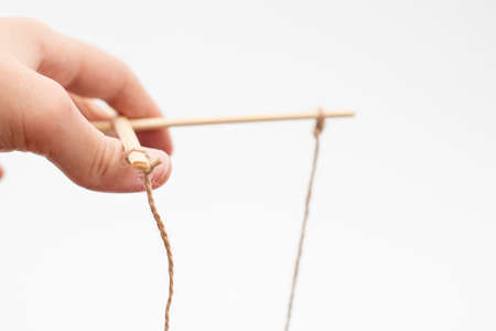 Puppet master hand controlling and manipulatingの写真素材