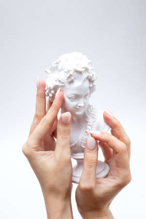 Womans hands with a professional manicure