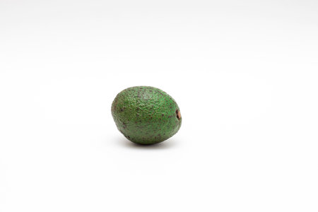 Whole avocado on a white background.の写真素材