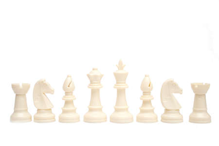 Set of white chess pieces are lined up isolated on a white backgroundの写真素材